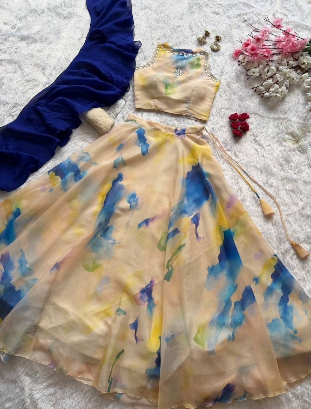 beige and blue lehenga
