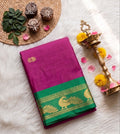 Kumkum and green silk saree