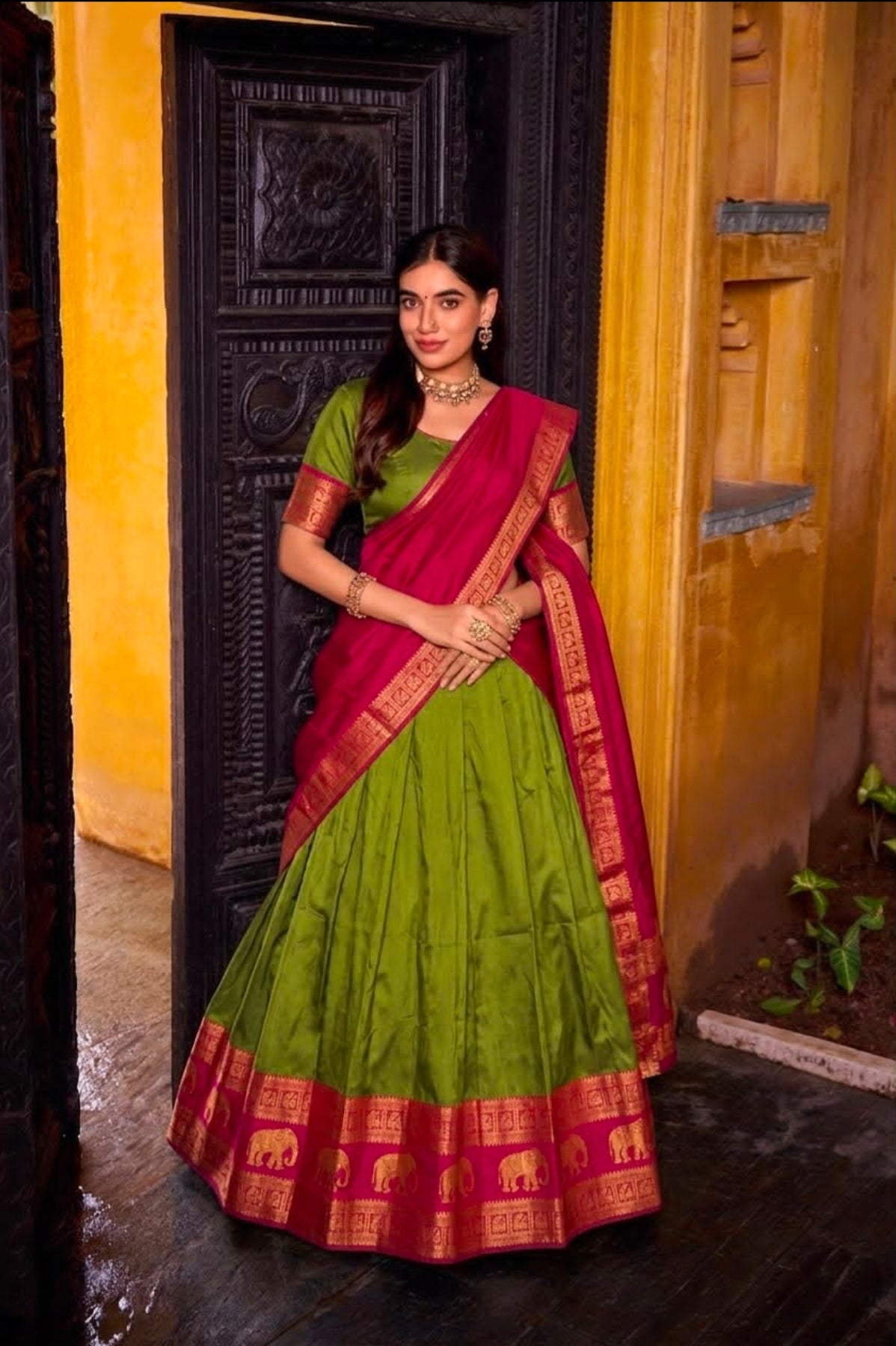 Green and pink south Indian lehenga
