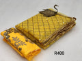 Yellow and gold sequins saree