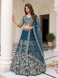 teal blue and gold lehenga