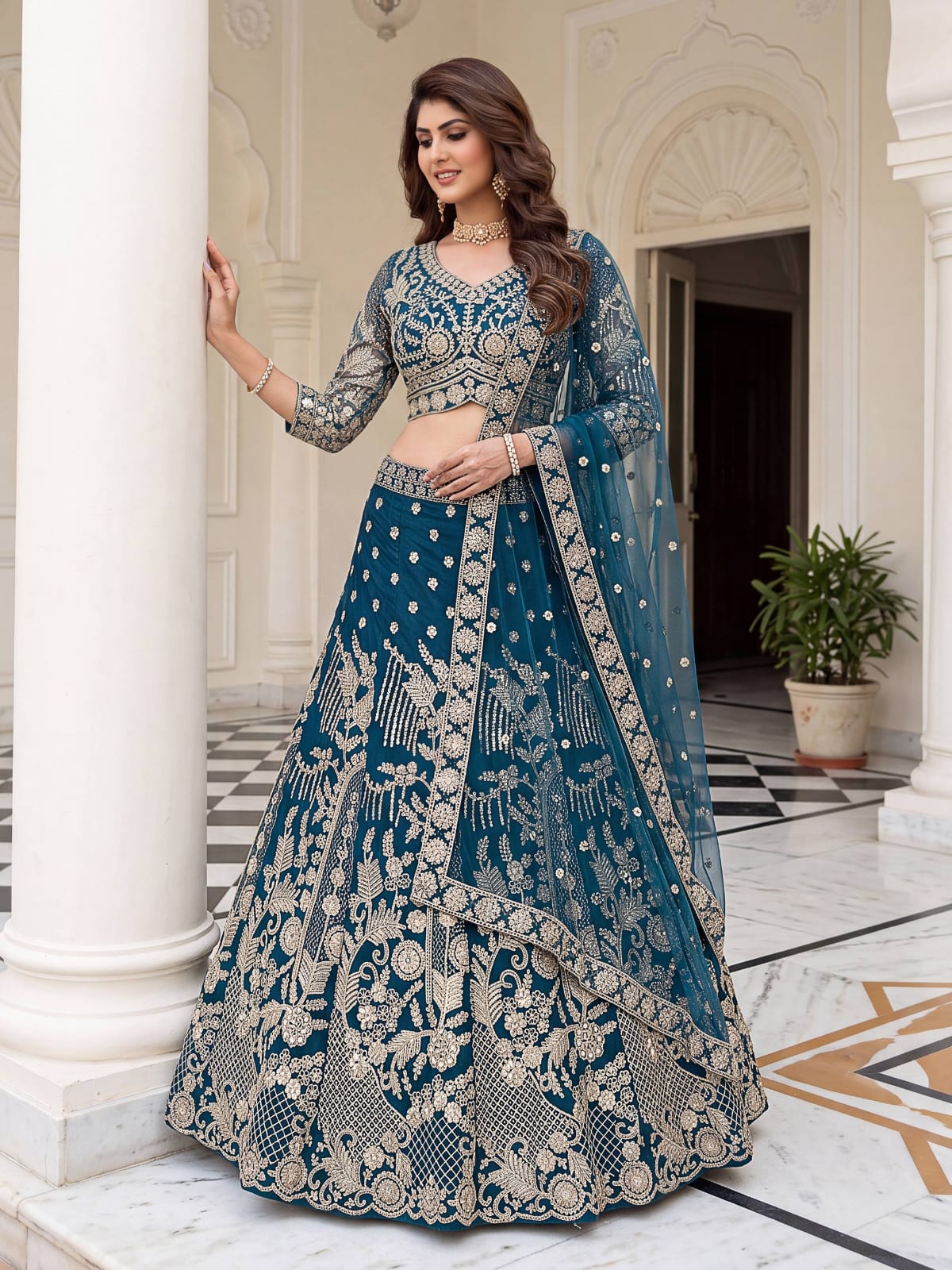 teal blue and gold lehenga
