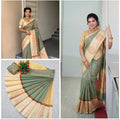 sage green and cream saree