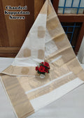 white and gold saree
