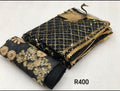 Black and gold sari