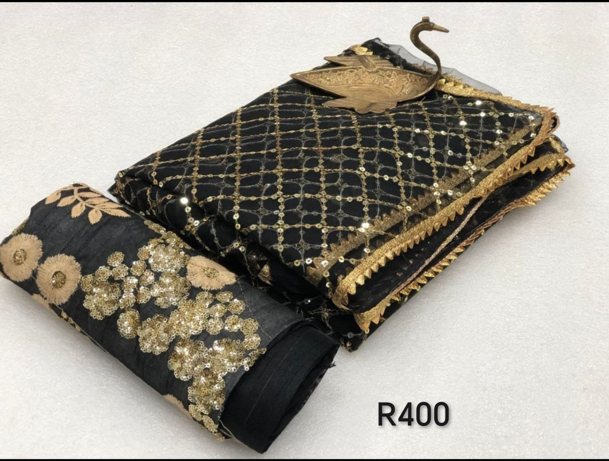 Black and gold sari